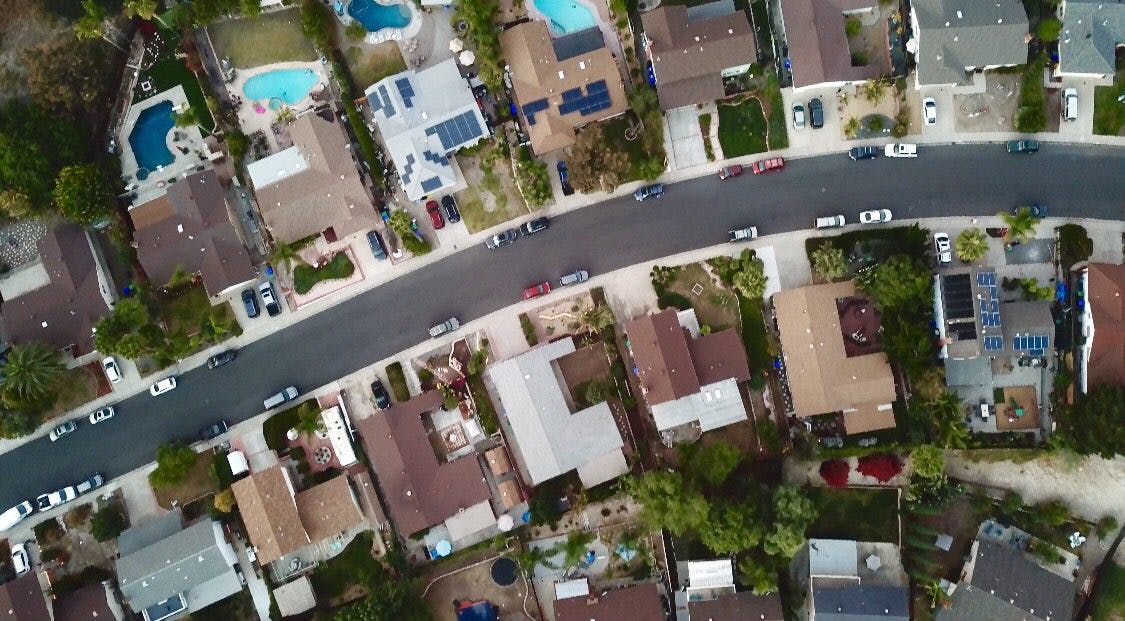 Aerial view of a Californian residential neighborhood showcasing the vibrant community and architectural diversity