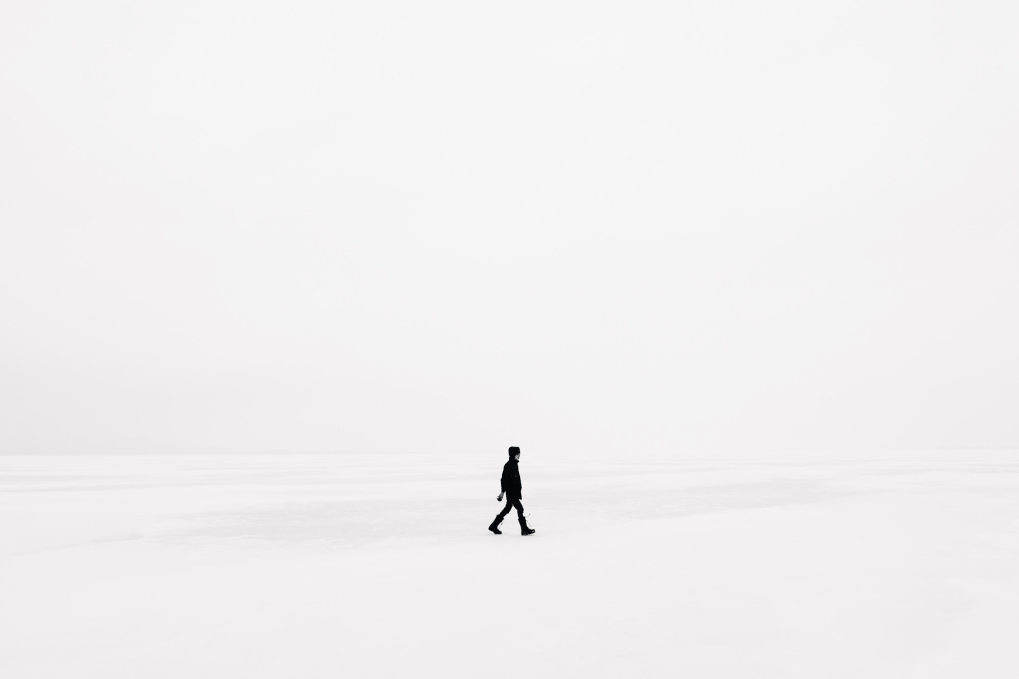 a person walking in the snow