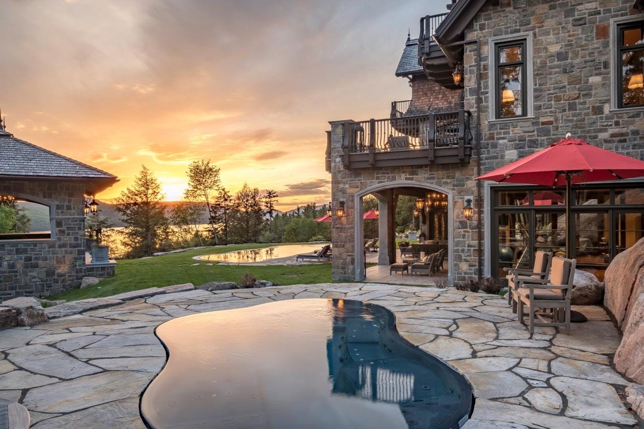 a pool in front of a house