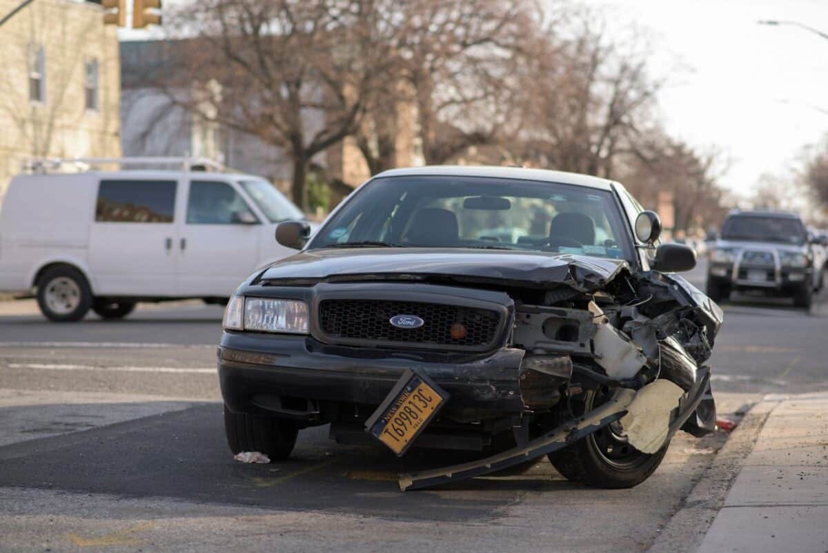 a car with a damaged front end