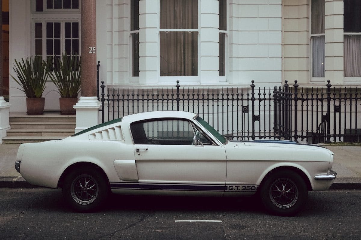 a white car parked on the street