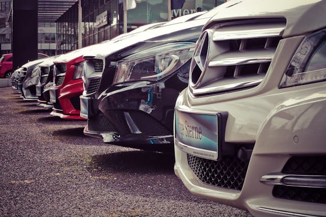 a row of cars parked in a row