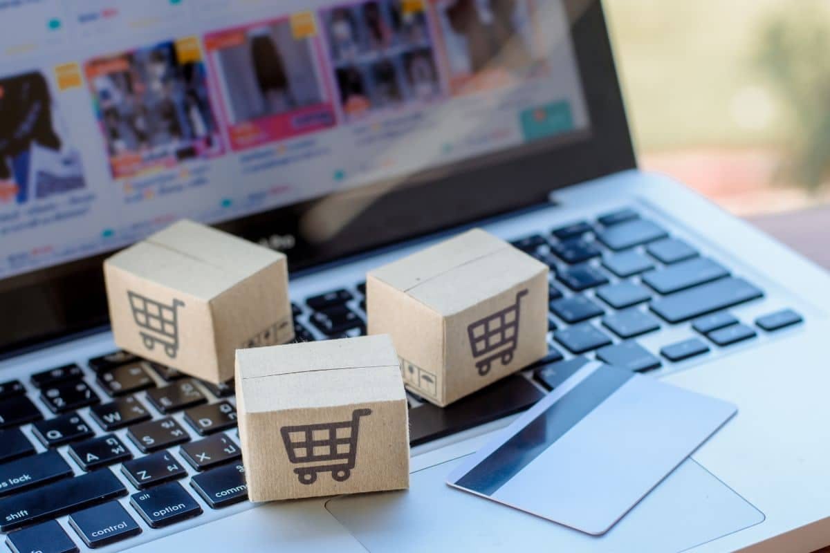 a group of boxes and a card on a laptop