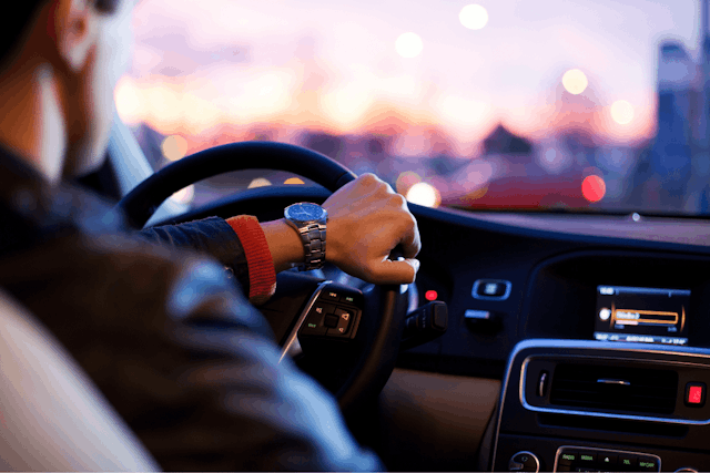 person driving the car in night