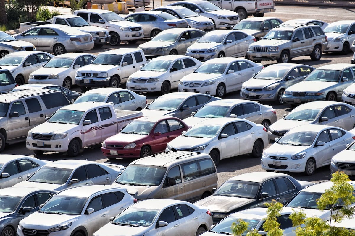 Parking lot filled with cars.