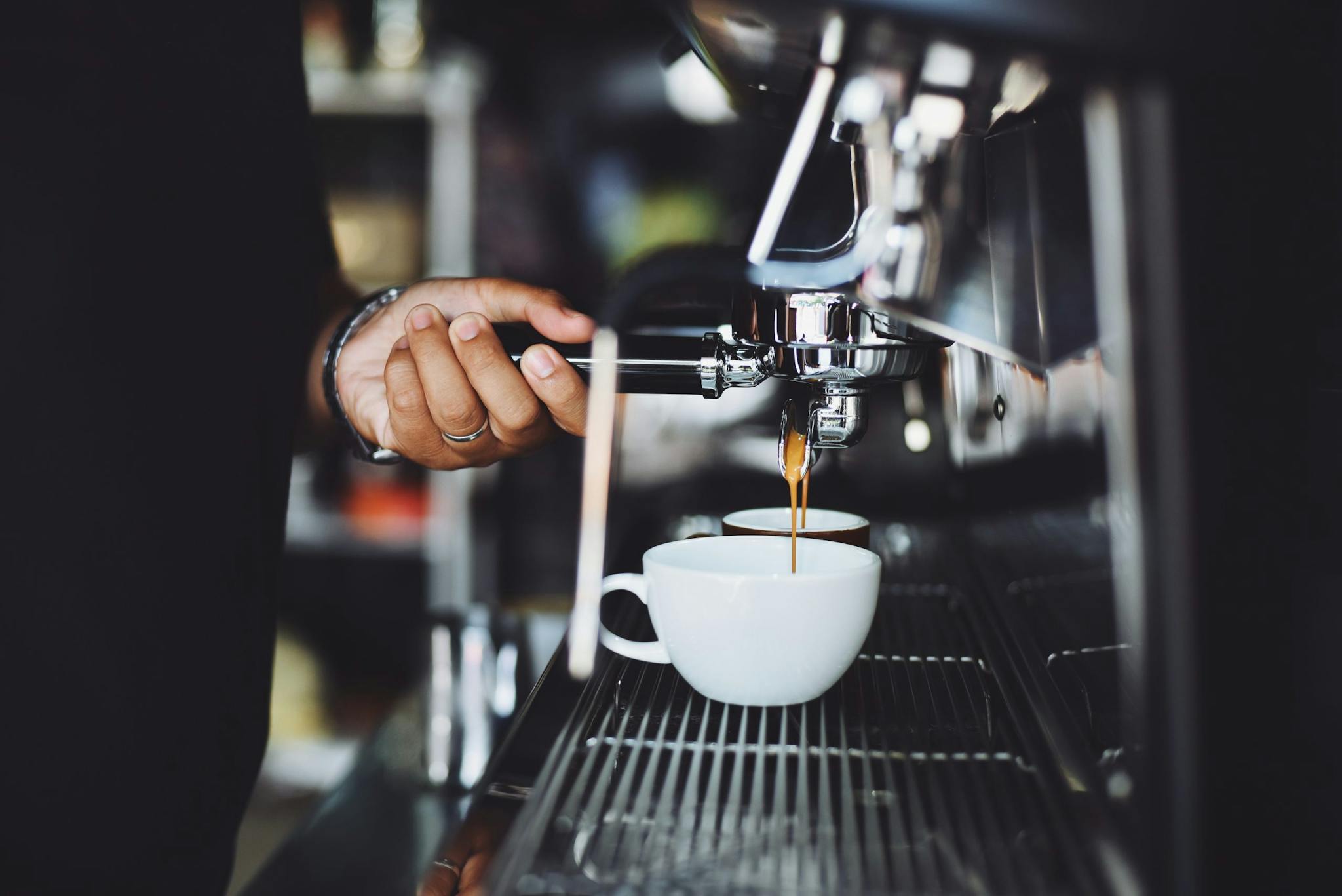 a person making a coffee