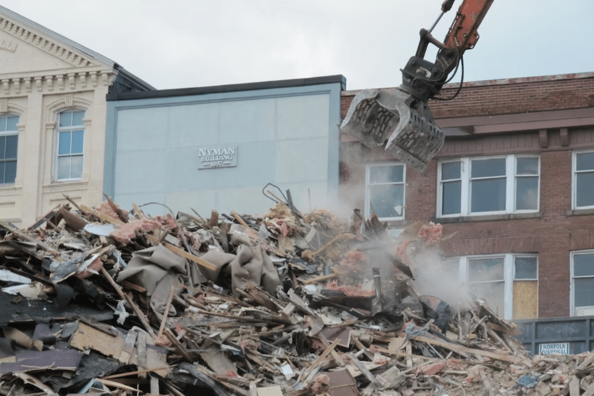 a construction site with a pile of debris