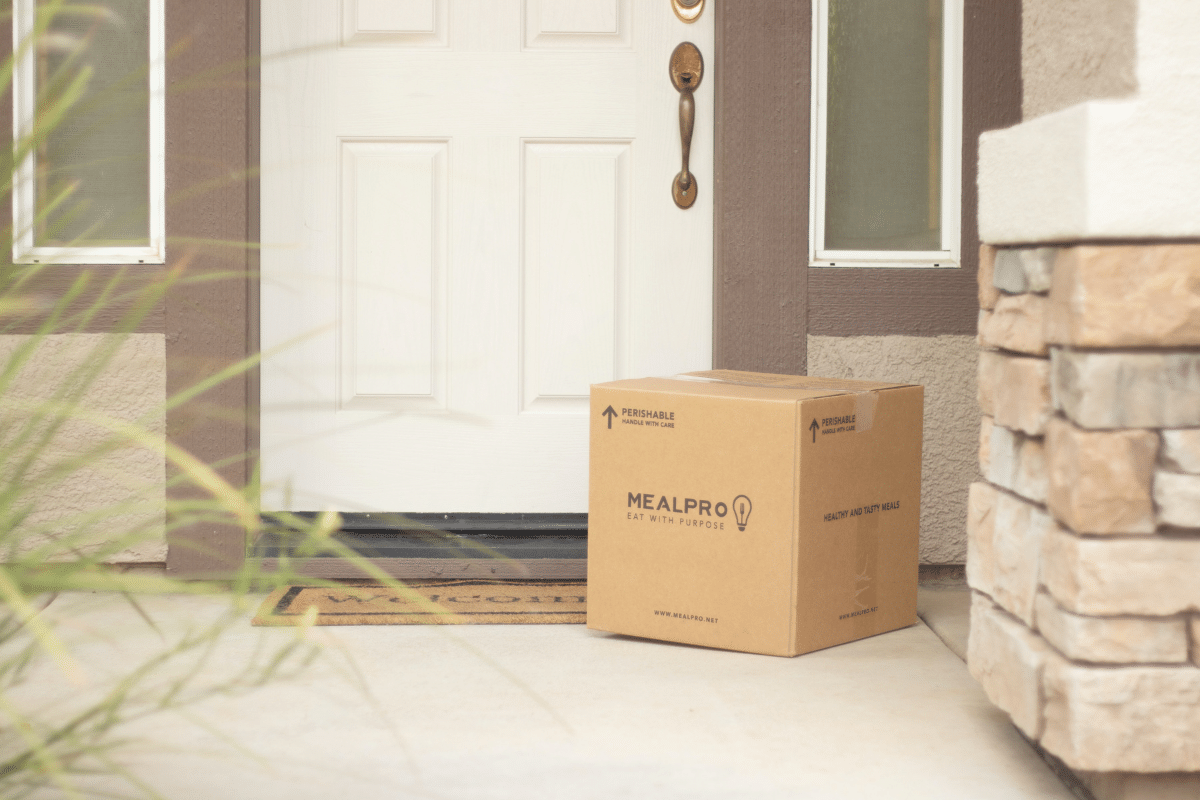 a box on the porch of a house