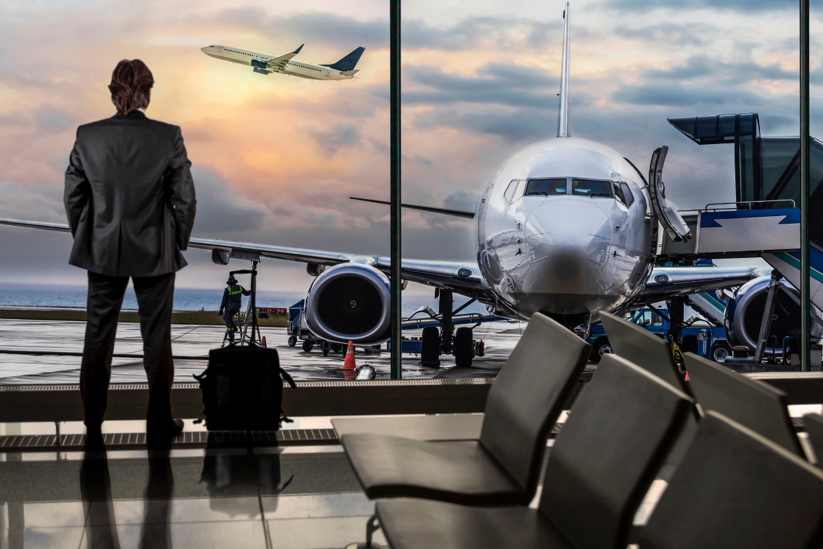 man waiting for his flight at a Canadian airport